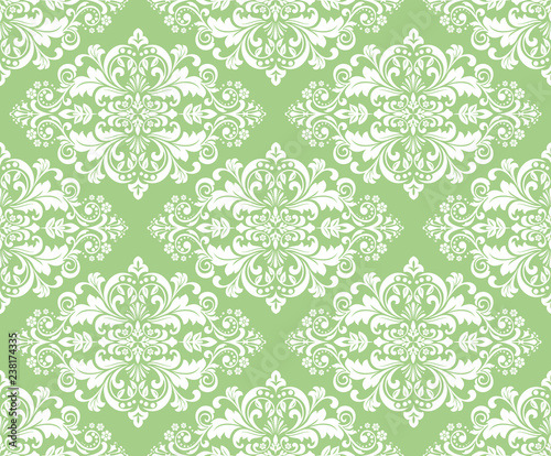 Wallpaper in the style of Baroque. Seamless vector background. White and green floral ornament. Graphic pattern for fabric, wallpaper, packaging. Ornate Damask flower ornament