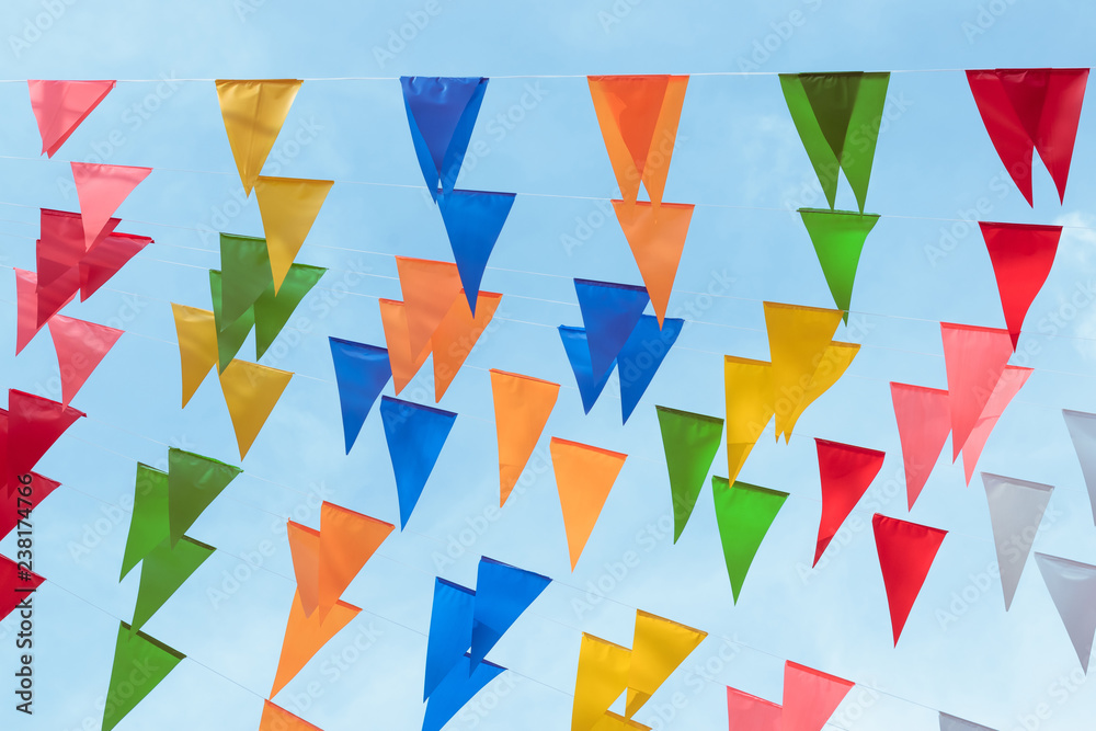 Fair flag bunting colorful background hanging on blue sky for fun fiesta  party event, summer holiday farm feast celebration, carnival festival  event, park or street festa design decoration Stock Photo | Adobe