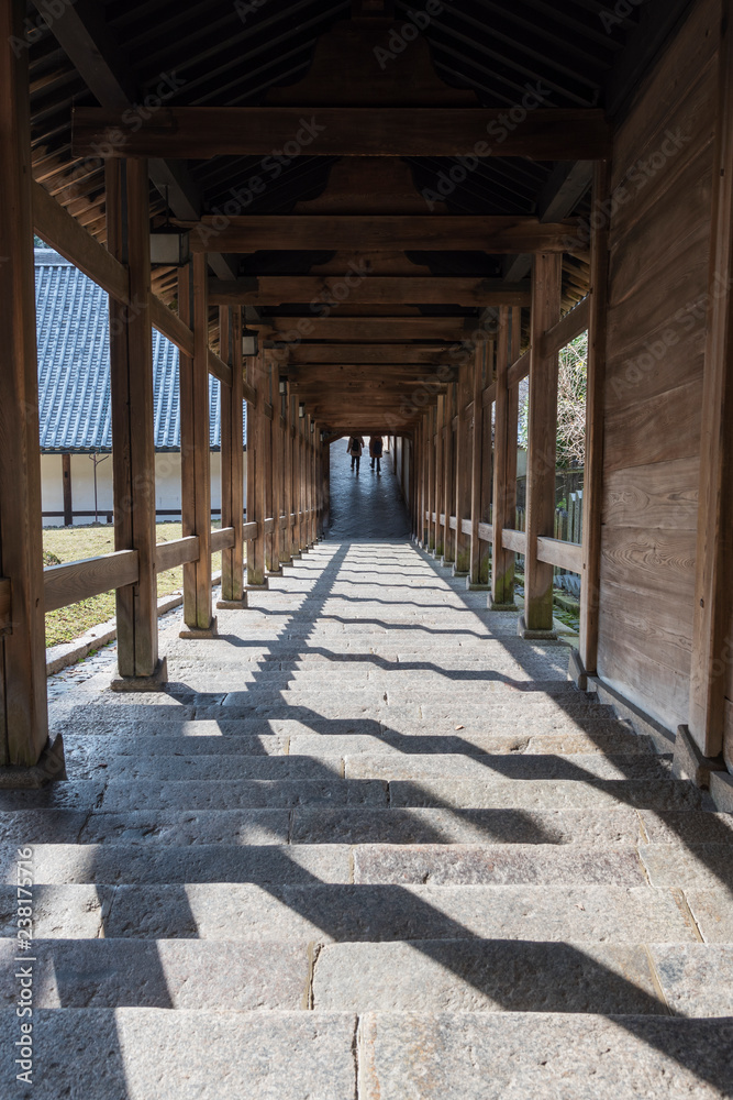 Sunlight streaming into the Stairway in temple, Nara, Japan