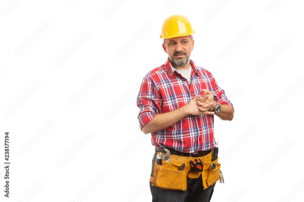 Constructor cracking knuckles as nervous concept.