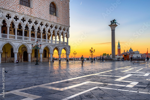 Sunrise view of piazza San Marco, Doge's Palace (Palazzo Ducale) in Venice, Italy. Architecture and landmark of Venice. Sunrise cityscape of Venice.