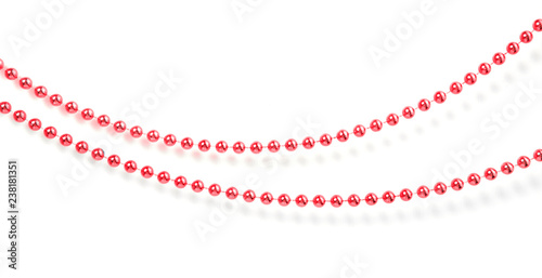 Red christmas beads garland isolated with shadow.
