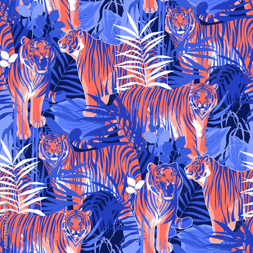 Graphic seamless patterns of tigers in different poses surrounded by exotic leaves