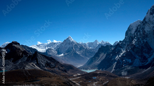 The iconic peak of Ama Dablam seen from the Everest three passes trek, after crossing Cho La high mountain pass.
