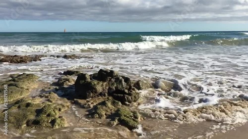 Surf at Esquinzo Buithondo Beach In Slow Motion