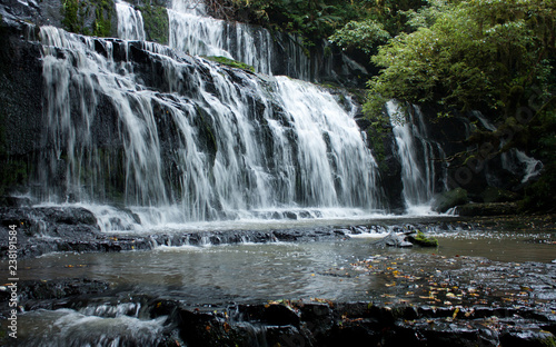 Purakaunui Falls from a distance in the Catlins in the South Island in New Zealand