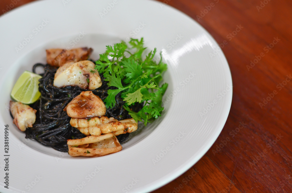 Black spaghetti with squid and shrimp paste sauce Black spaghetti with squid and shrimp paste sauce
