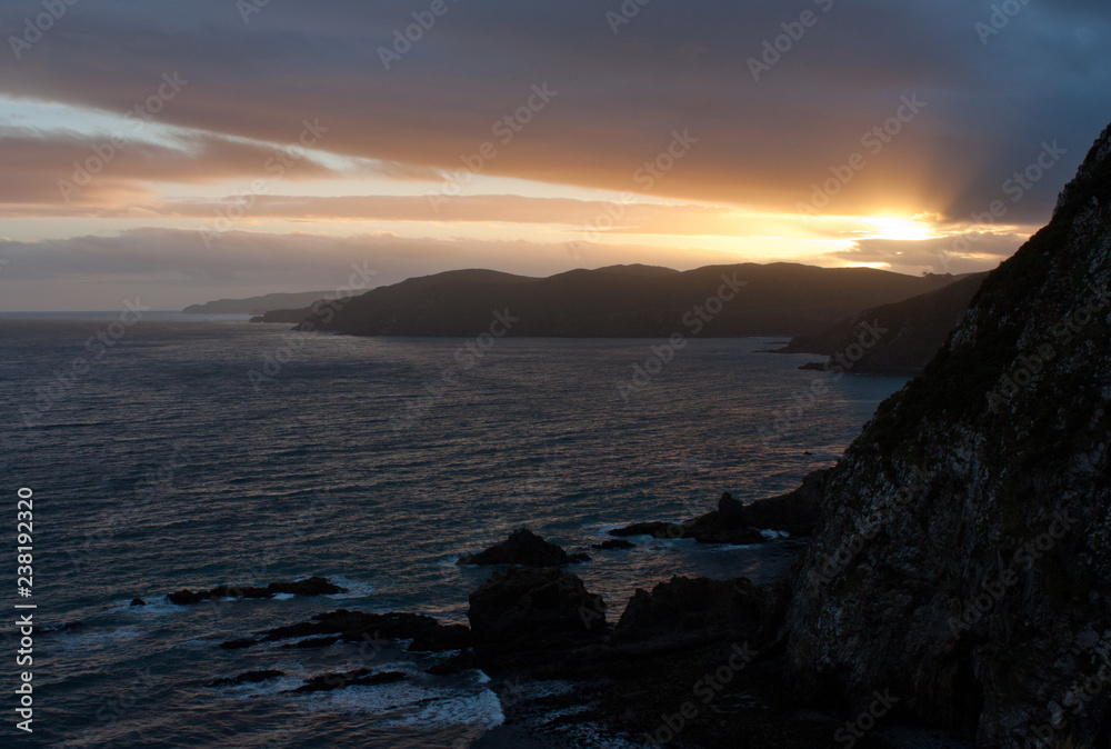 Sunset at the Nugget Point in the Catlins in the Central Otago in the South Island in New Zealand