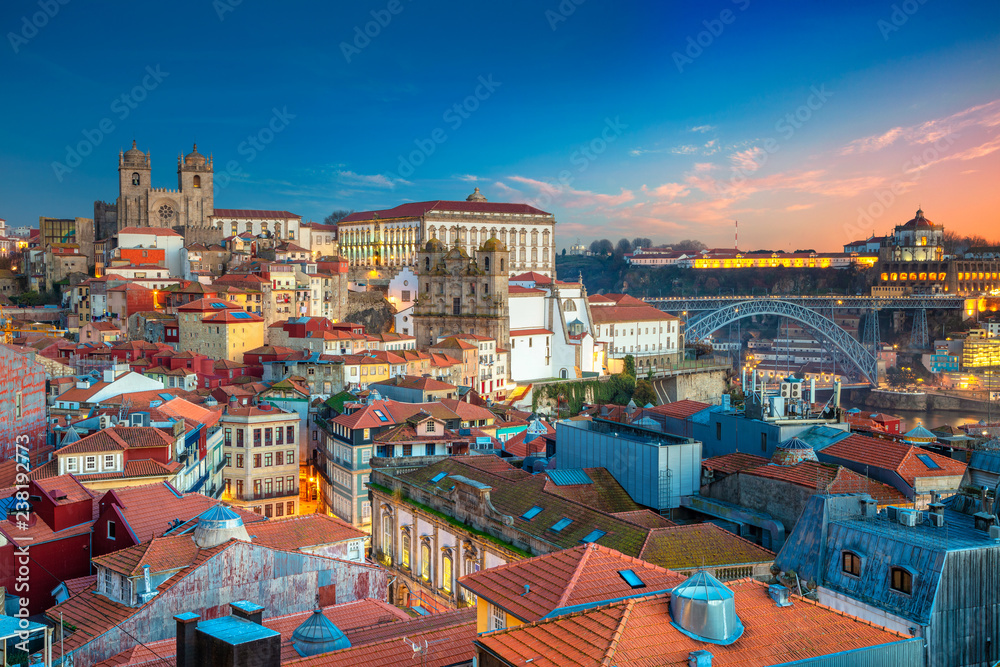 Porto, Portugal. Aerial cityscape image of Porto, Portugal with the Porto Cathedral and old town during sunset.