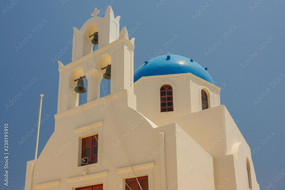 The crosses on the bell towers of some Greek churches