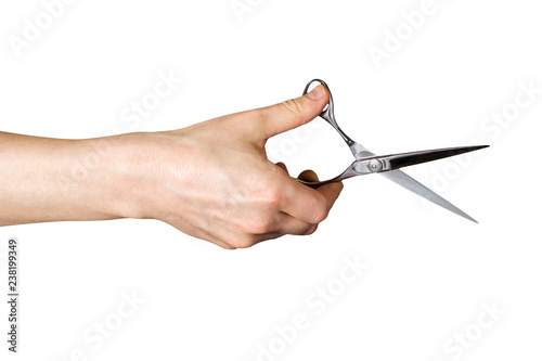 Obraz na płótnie hand holding a scissors on an isolated white background w salonie