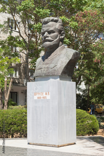 Bust of Mikhail Vasilyevich Frunze at the intersection of Frunze and Nekrasov streets in the city of Evpatoria, Crimea, Russia photo