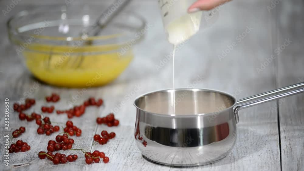 Pour the milk into a saucepan. Pour the milk into a saucepan.