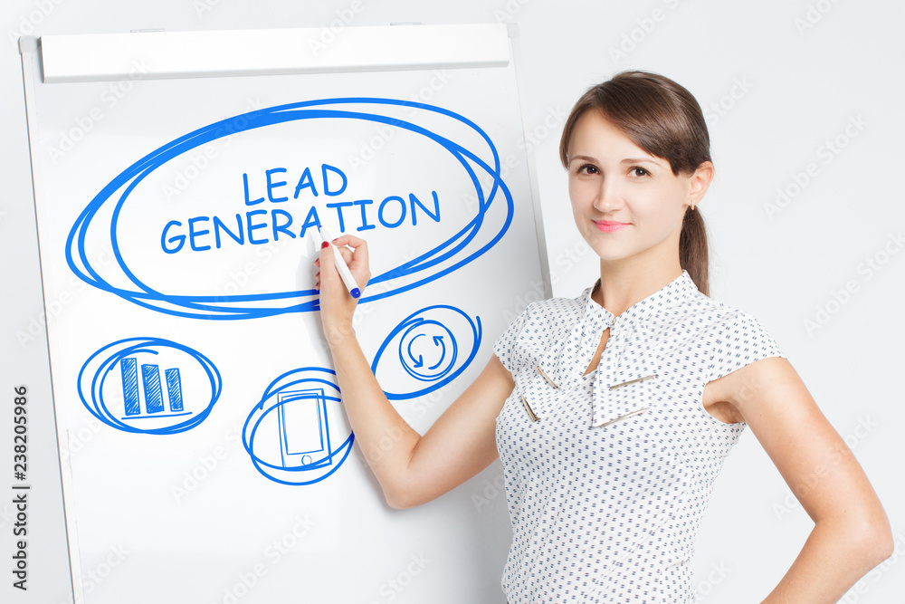 Business, Technology, Internet and network concept. A young entrepreneur writes on the blackboard the word: Lead generation Business, Technology, Internet and network concept. A young entrepreneur writes on the blackboard the word: Lead generation
