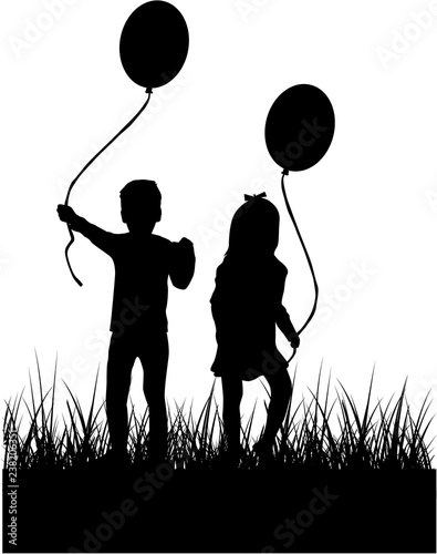 Silhouette of children with balloon.