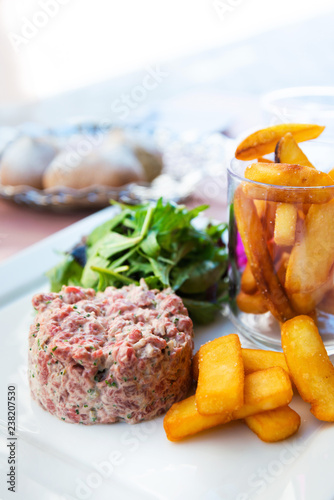 tasty Steak tartare (Raw beef) - classic steak tartare on white plate