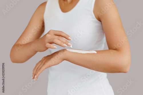 Wallpaper Mural Hand Skin Care. Close Up Of Female Hands Holding Cream Tube, Beautiful Woman Hands With Natural Manicure Nails Applying Cosmetic Hand Cream On Soft Silky Healthy Skin. Beauty And Body Care Concept Torontodigital.ca