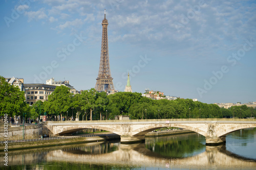 PARIS, FRANCE - MAY 26, 2018: View of the Eiffel Tower and the Invalides Bridge. Embankment of the Seine. © KURLIN_CAfE