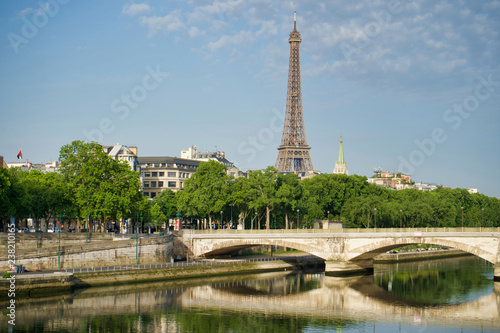 PARIS, FRANCE - MAY 26, 2018: View of the Eiffel Tower and the Invalides Bridge. Embankment of the Seine.