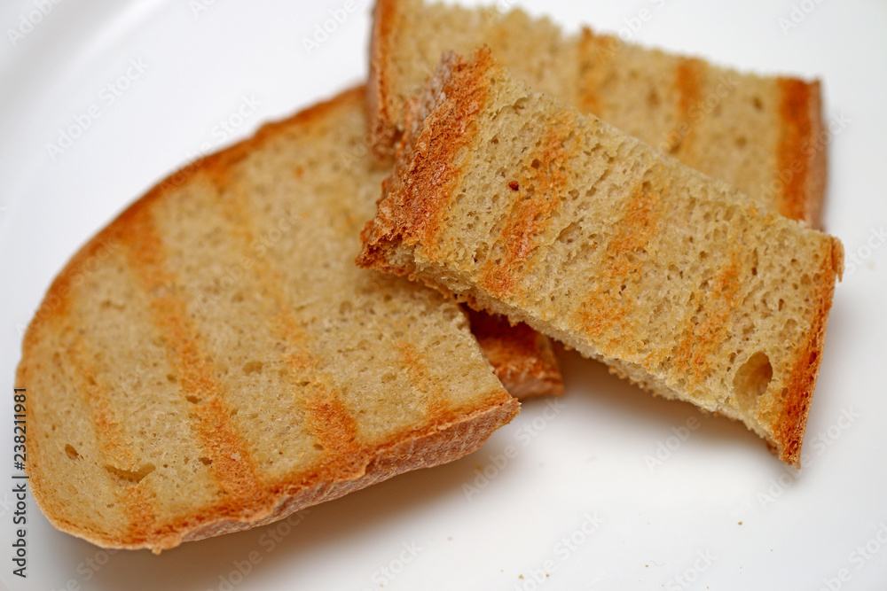 Bread of fried croutons on a white background Bread of fried croutons on a white background