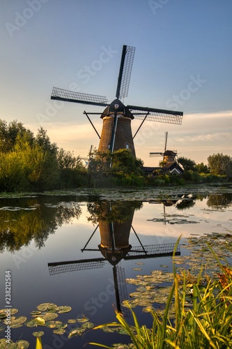 view of traditional windmills in Kinderdijk, The Netherlands. © ververidis