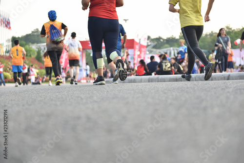 Closeup, the runners  running at Royal Park.in the moning, a lot of copy space.
