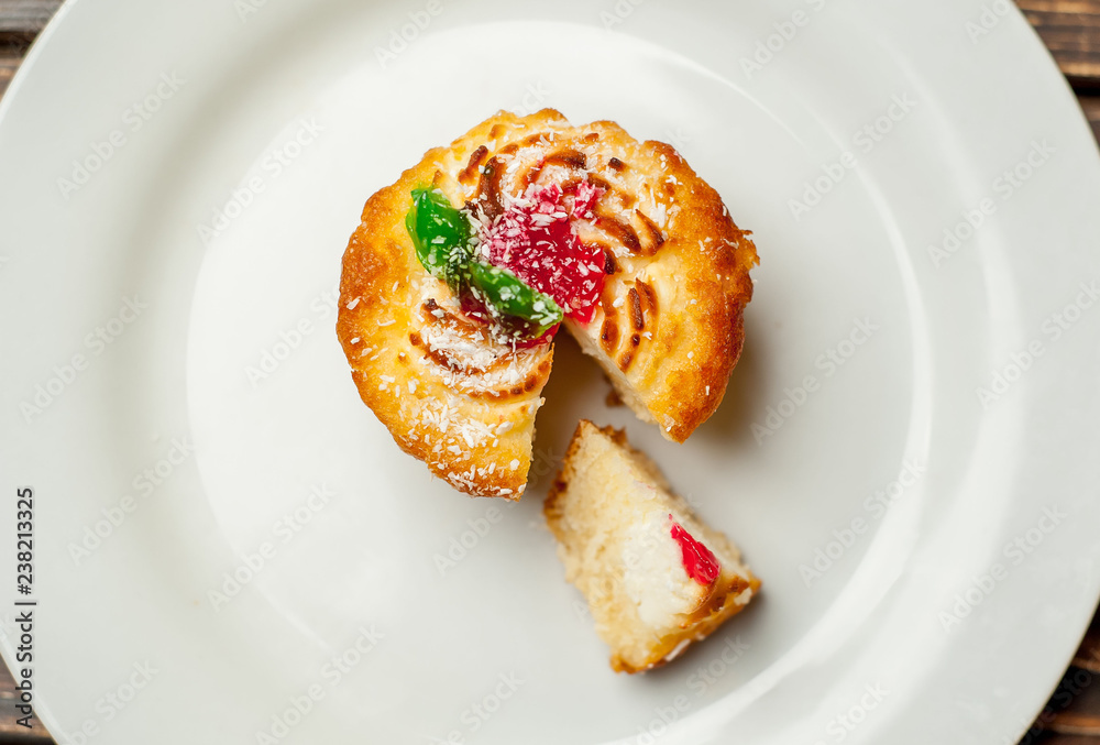 cake in a plate on a wooden background cake in a plate on a wooden background