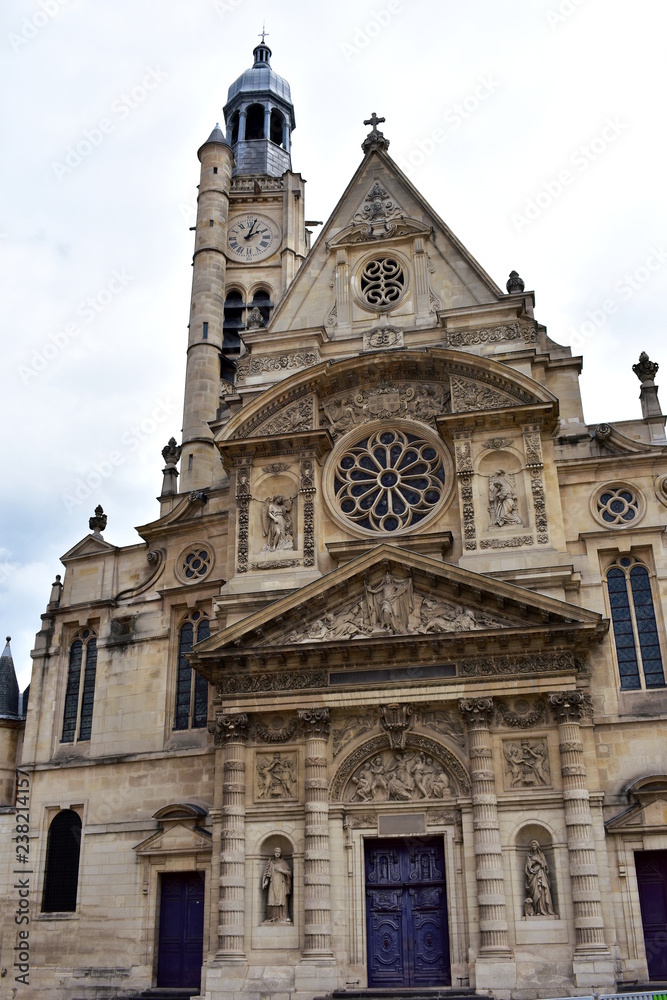 Saint Etienne du Mont church, Latin Quarter. Paris, France, facade closeup, cloudy day.
