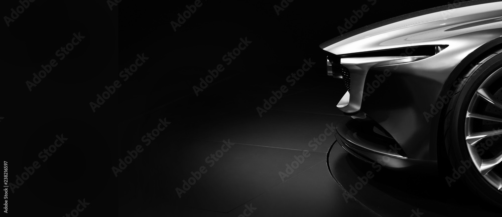 Obraz premium Szczegóły na jednym z reflektorów LED nowoczesnego samochodu na czarnym tle