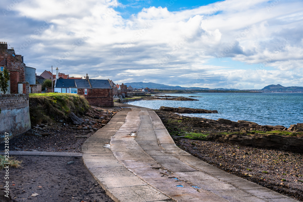 Empty Stone Coastal Path in a Seaside Town in Scotland on a Cloudy Autumn Day