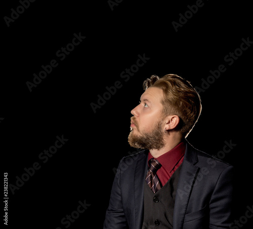  man with a beard on a black background