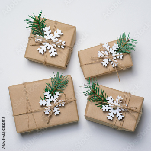 Christmas Gifts with Fir Branches on White Background, Winter Holidays Concept