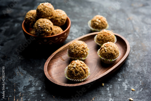 Oats laddu or Ladoo also known as Protein Energy balls. served in a plate or bowl. selective focus