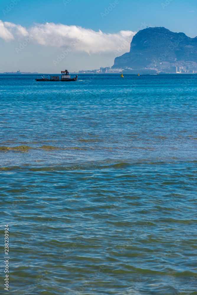 The rock of Gibraltar and a boat
