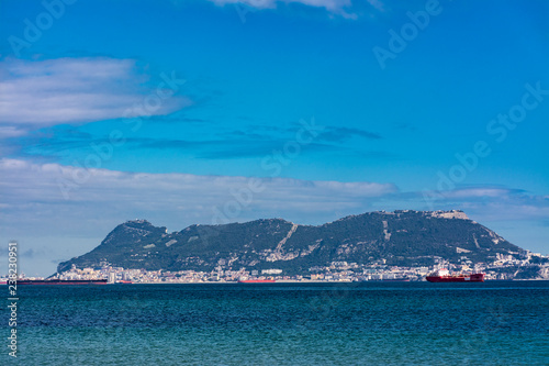 The rock of Gibraltar and a cargo ship