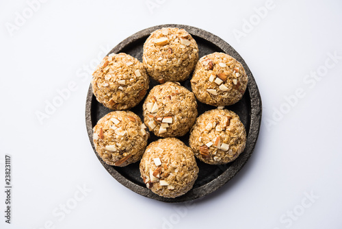 Oats laddu or Ladoo also known as Protein Energy balls. served in a plate or bowl. selective focus