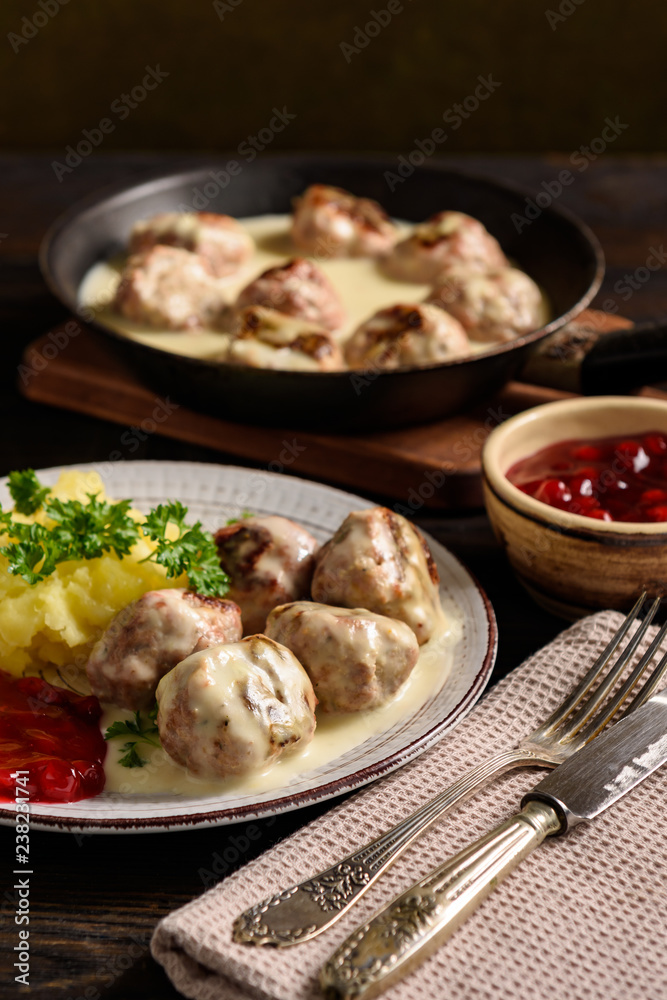 Swedish meatballs  with creamy gravy, mashed potatoes and lingonberry sauce.