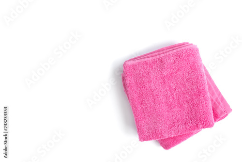 Pink towel isolated on white background.