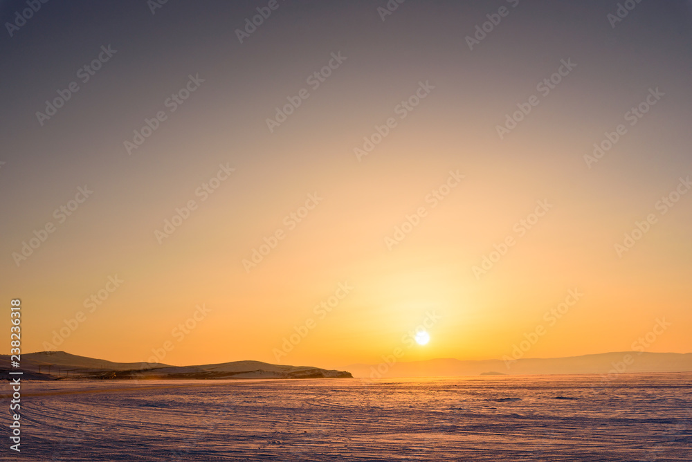 sunset sun in the vast expanses of Lake Baikal on Olkhon Island