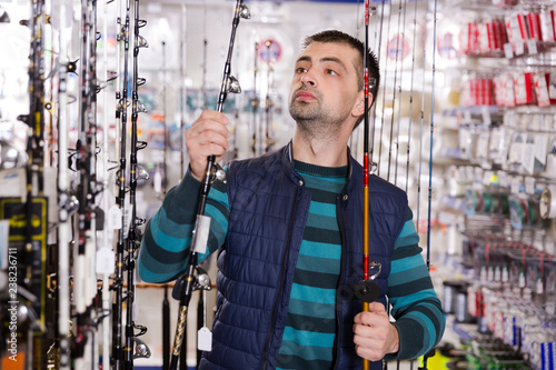 buyer selectioning fishing rod