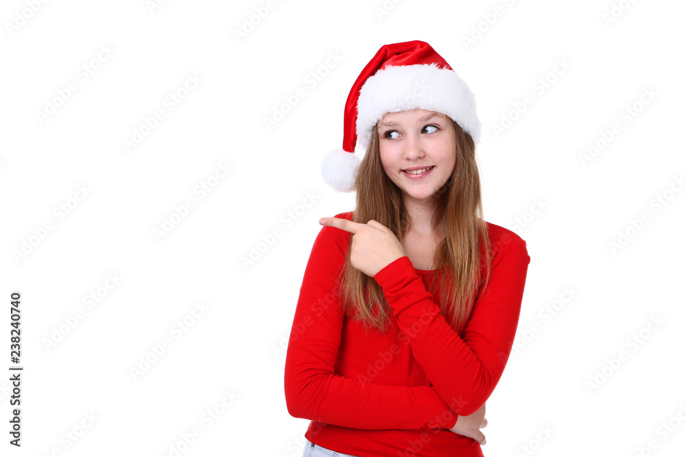 Young girl in santa hat on white background Young girl in santa hat on white background