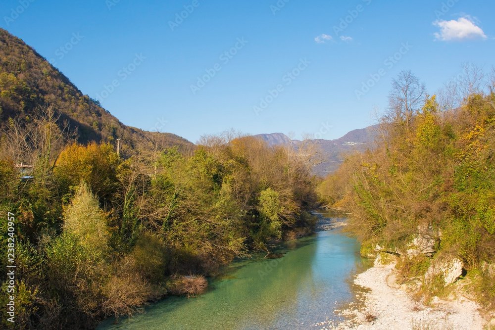 The autumnal Natisone River in Friuli Venezia Giulia, north east Italy, near the town of San Pietro Al Natisone The autumnal Natisone River in Friuli Venezia Giulia, north east Italy, near the town of San Pietro Al Natisone