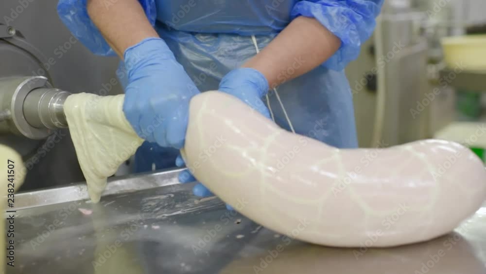 production of boiled sausages and smoked sausage at a meat factory. Food industry