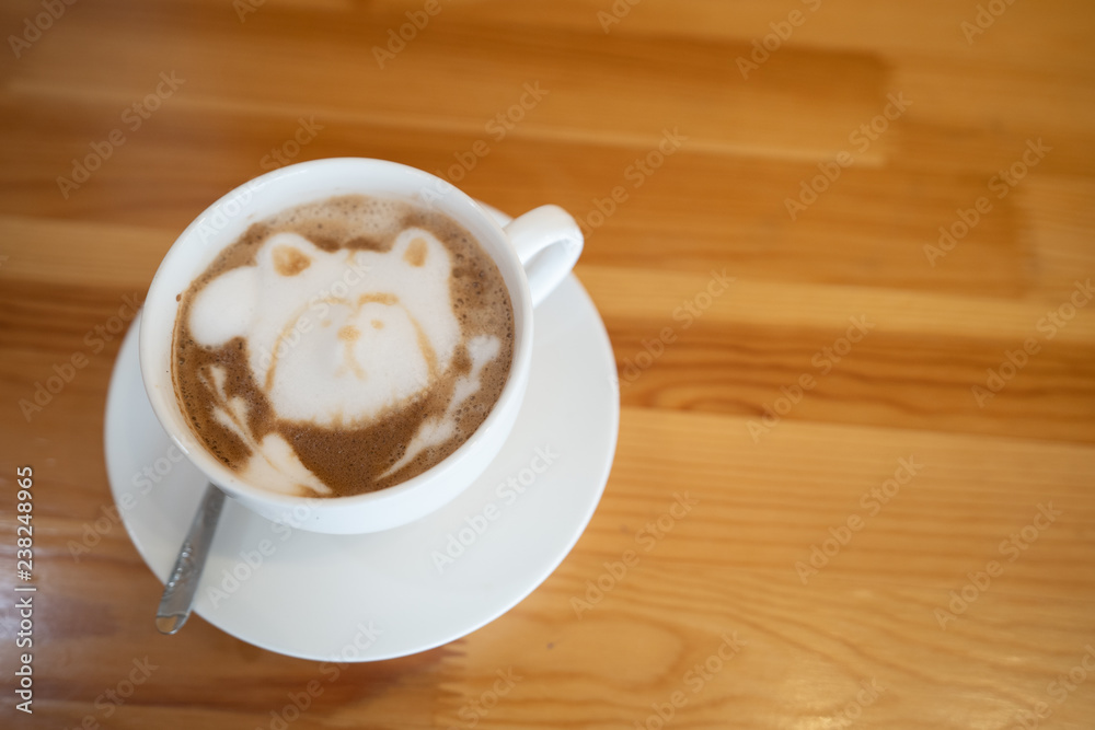 Fototapeta premium cup of coffee on wooden table