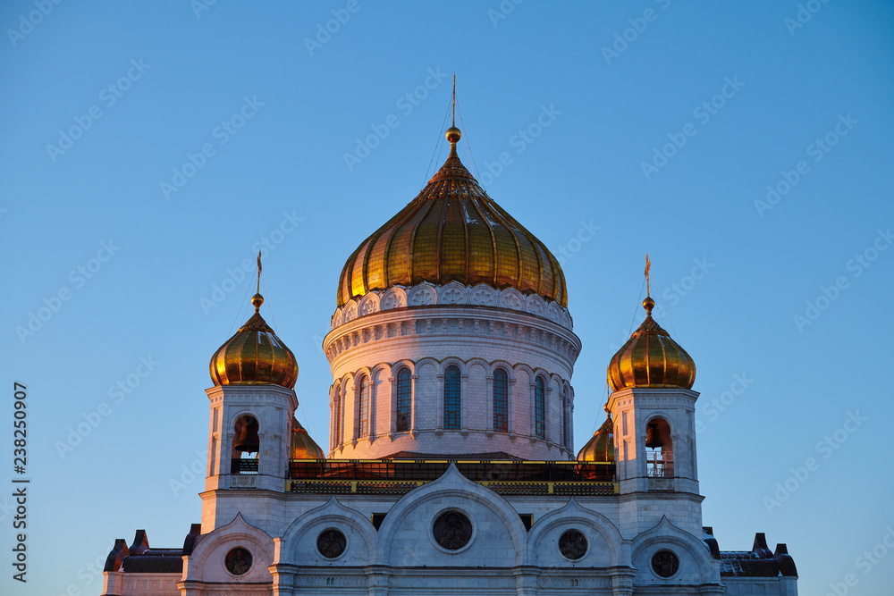 Golden domes of the Moscow's Cathedral of Christ the Saviour in sunset light