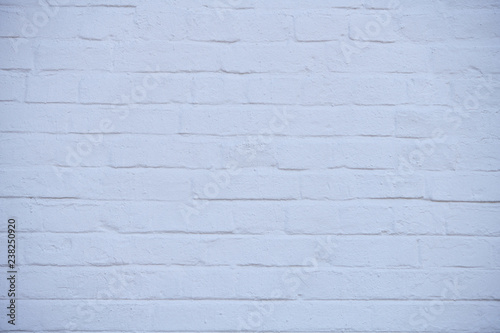 The texture of brick wall colored in white or grey  background