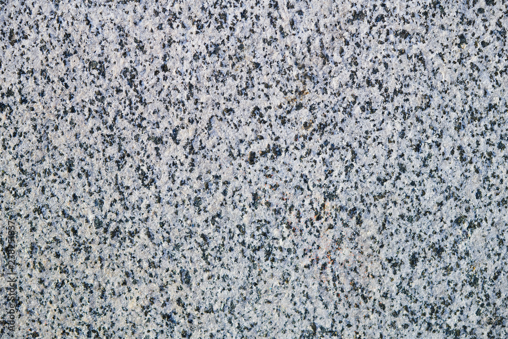 The textured grey marble chips wall, background The textured grey marble chips wall, background