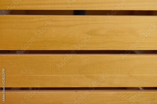 The texture of a wooden wall with horizontal stripes of natural boards, background