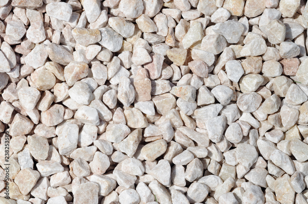 Small decorative limestone stones of light beige tone. Small decorative limestone stones of light beige tone.