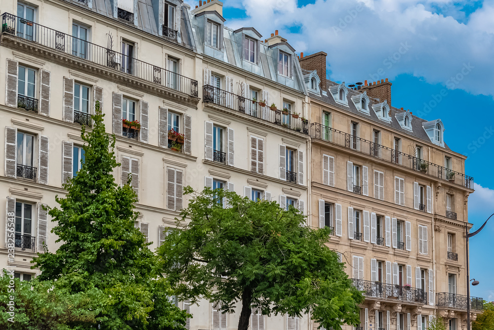 Paris, beautiful building in the center, typical parisian facade boulevard Voltaire 